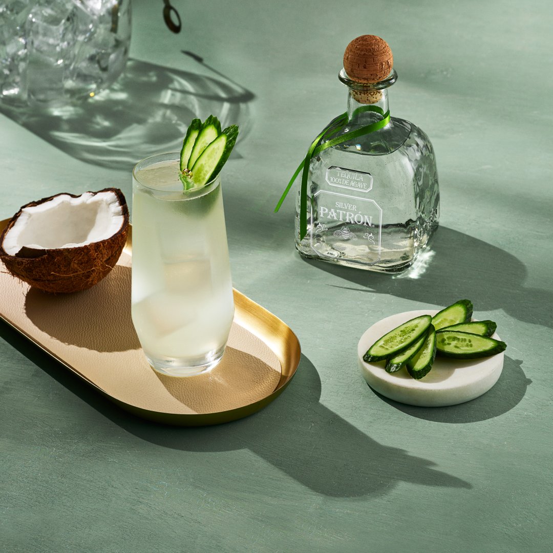 Patron's tweet photo. Savor the last moments of summer with an iced Cucumber-Coconut Margarita in hand. Head to our Cocktail Lab to find the recipe and enjoy a breezy twist on a classic summer serve. https://t.co/IF7VetxY9b #PatronTequila #TequilaThursday #SummerWithPatron #MakeSummerSensational https://t.co/rtYbH57Jfy