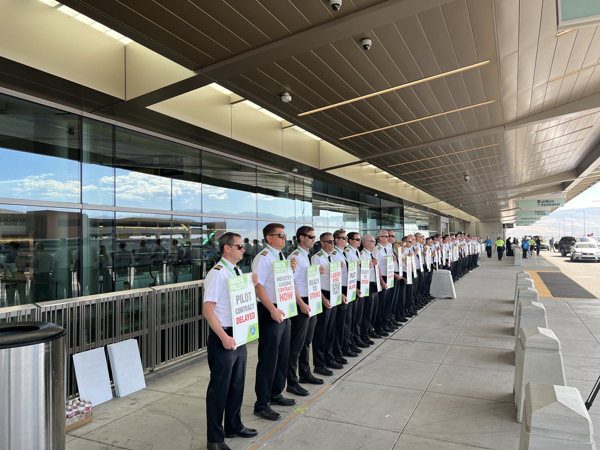 Delta_Pilots's tweet photo. .@slcairport is another major @Delta hub we are picketing at to show the @Delta_Pilots are willing to go the distance to get the contract we have earned!
#DeltaPilots #DeltaPilotContractNow #DeltaPilotsReadyToStrike #LaborRiskIsBackOnTheTable #HatsOff #SLC https://t.co/laIxd0peVp