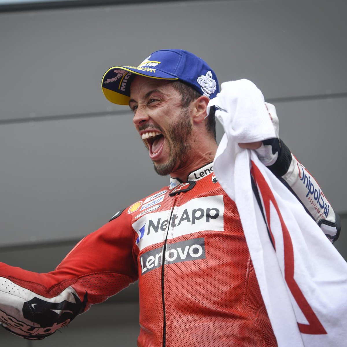 MotoGP's tweet photo. A spectacular career draws to a close! 😢

After 21 years, 24 victories and many magical memories, @AndreaDovizioso hangs up his helmet following today's race! 👏

#SanMarinoGP 🇸🇲 https://t.co/AzadQSVYrk