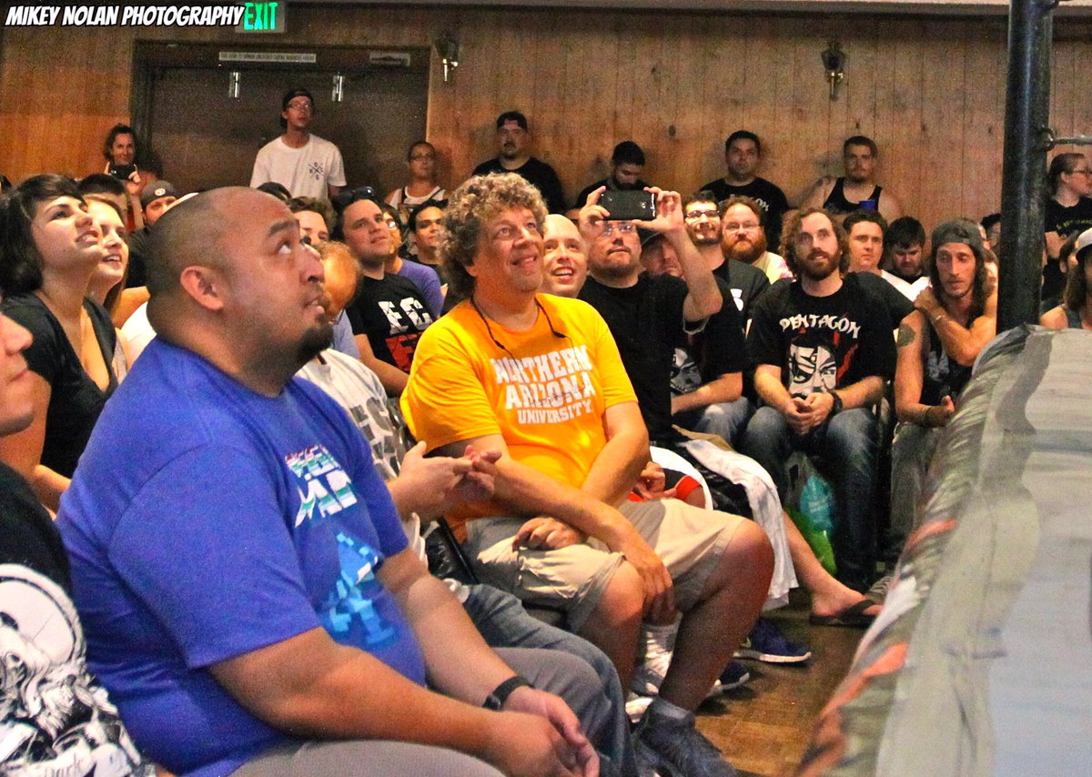 MIKEY__NOLAN's tweet photo. Alan “Dink” Denkenson loved pro wrestling and he loved @OfficialPWG
Front row for nearly every show for a decade, his smile brightened up the room. He brought many newcomers and always spread the word about the company. Here’s a photo of Alan in his happy place!
#RIPDink https://t.co/zsFuHHE8GW