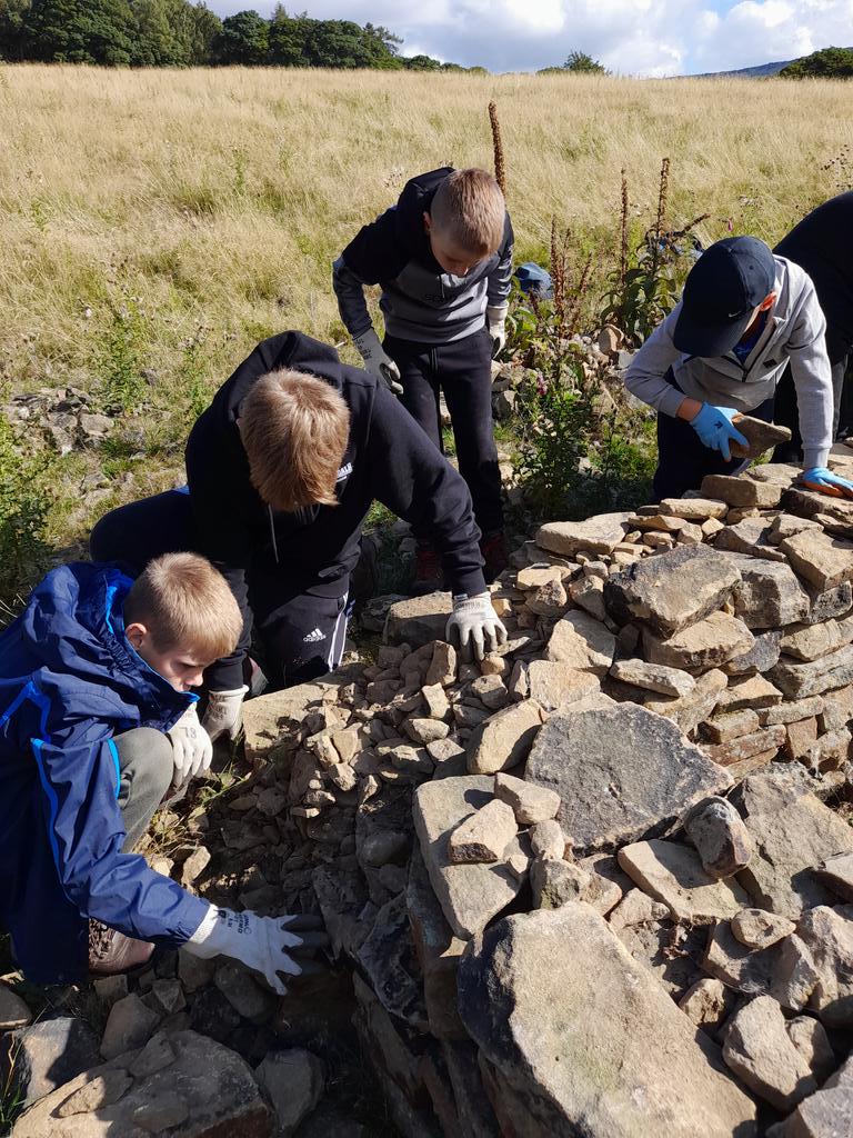 HighgateSileby's tweet photo. Great morning building dry stone walls before making rafts for a boat race. Even better that the staff-raft won the race... https://t.co/nq2ZdPBdW6