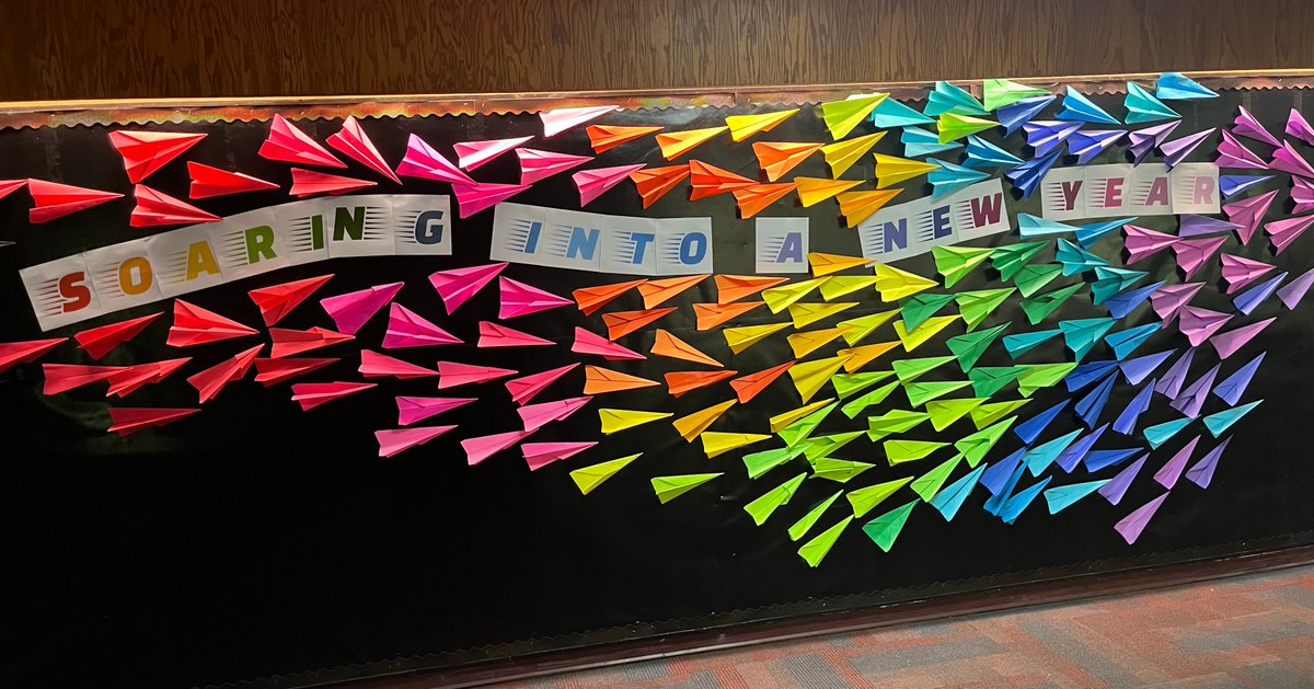 This welcome bulletin board at Browns River Middle School was a labor of love with many joining in to make these paper airplanes! #teamwork #mmuusd #vted ✈️