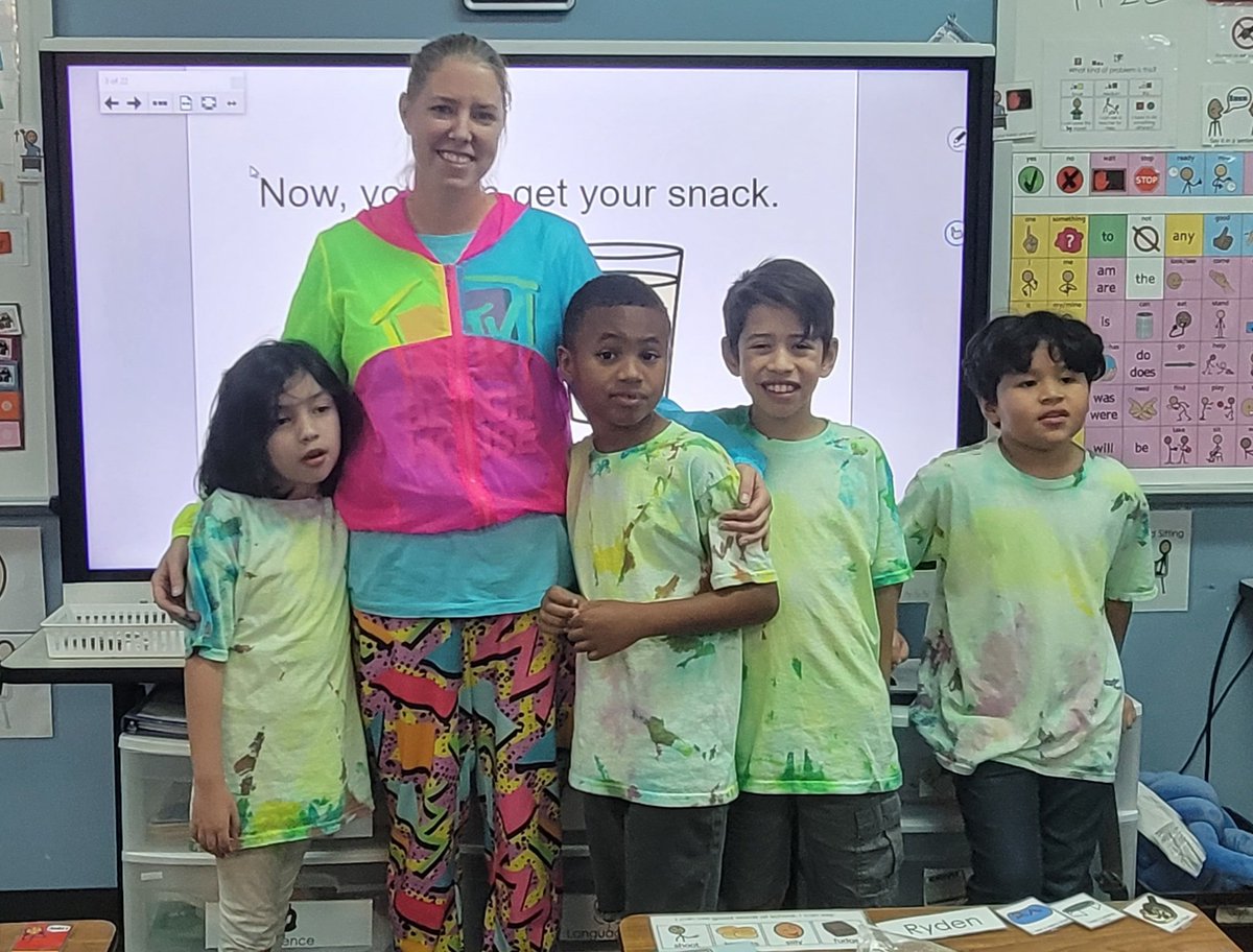 CTomec's tweet photo. My tigers are proudly wearing the neon tie-dye shirts they made during the first week of school to highlight the fake information for #DigitalCitizenshipWeek  @TStudentsupport @TISDGOES https://t.co/IPJAy3pn3F