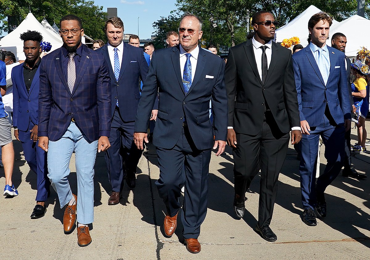 Pitt head coach Pat Narduzzi leads his team in the Panther Prowl as they make their way to Acrisure Stadium to take on WVU.