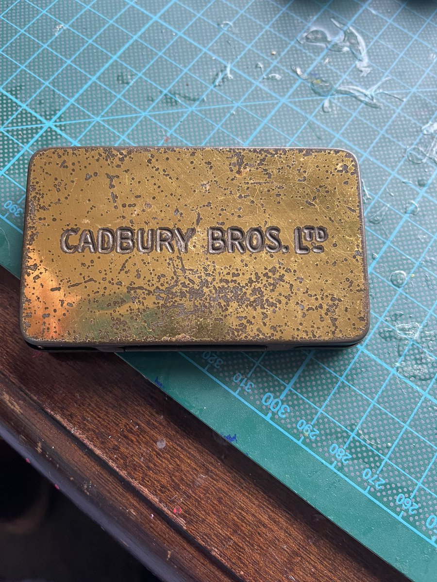 <a href="/CadburyUK/">Cadbury UK</a> Just found an old tin belonging to my grandmother from the coronation in 1902. It still has the chocolate in it and you can see the Cadbury imprint! #coronationtin #cadbury