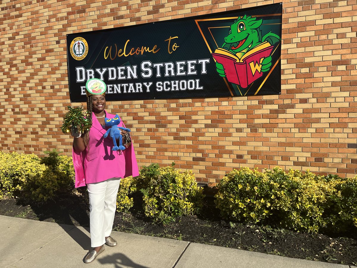 Dr. Tahira Dupree Chase, Superintendent of Westbury Schools, welcomed families at Dryden Street School this morning.  The children were excited to meet her and the school’s reading mascot, Pete the Cat. Ms. Zizzo (kindergarten teacher) presented her with a dragon headband.