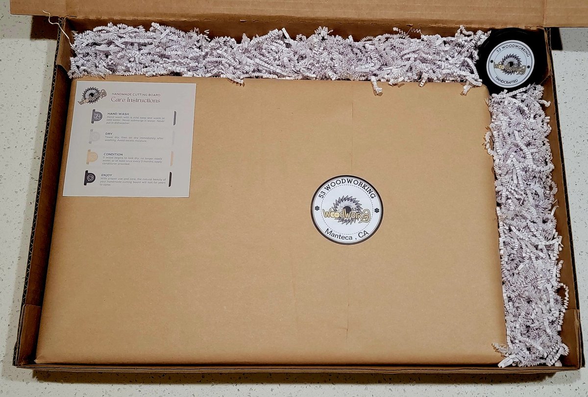 The final step, packaging. We had boxes custom made for our boards. We also include care instructions and a can of board wax/conditioner that we make. All boards are packed and headed to the customer in Utah.#53woodworking #juicegroove #cuttingboard #sawdust #walnut #padauk
