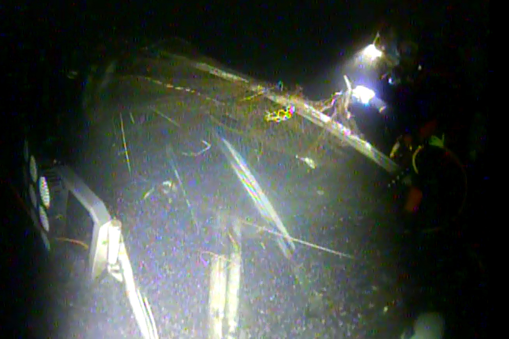 USCGNorthwest's tweet photo. #Update #AleutianIsle (1/2) Photos from wreck site: Divers cut away netting from vessel to locate fuel vents and prevent vessel entanglement during the scheduled recovery operation. They also located 4 valves and secured them, including valves for waste oil and hydraulic fluid. https://t.co/Whbe2Gp6BC