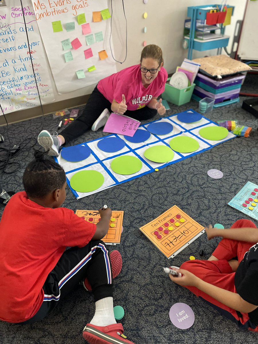 Two thumbs up! These kiddos are amazing math scholars this morning! They were listening and having fun at the same time! What a better way to learn math strategies than the teacher presenting a colorful visual that definitely had their attention! Way to go Ms. Evans!
