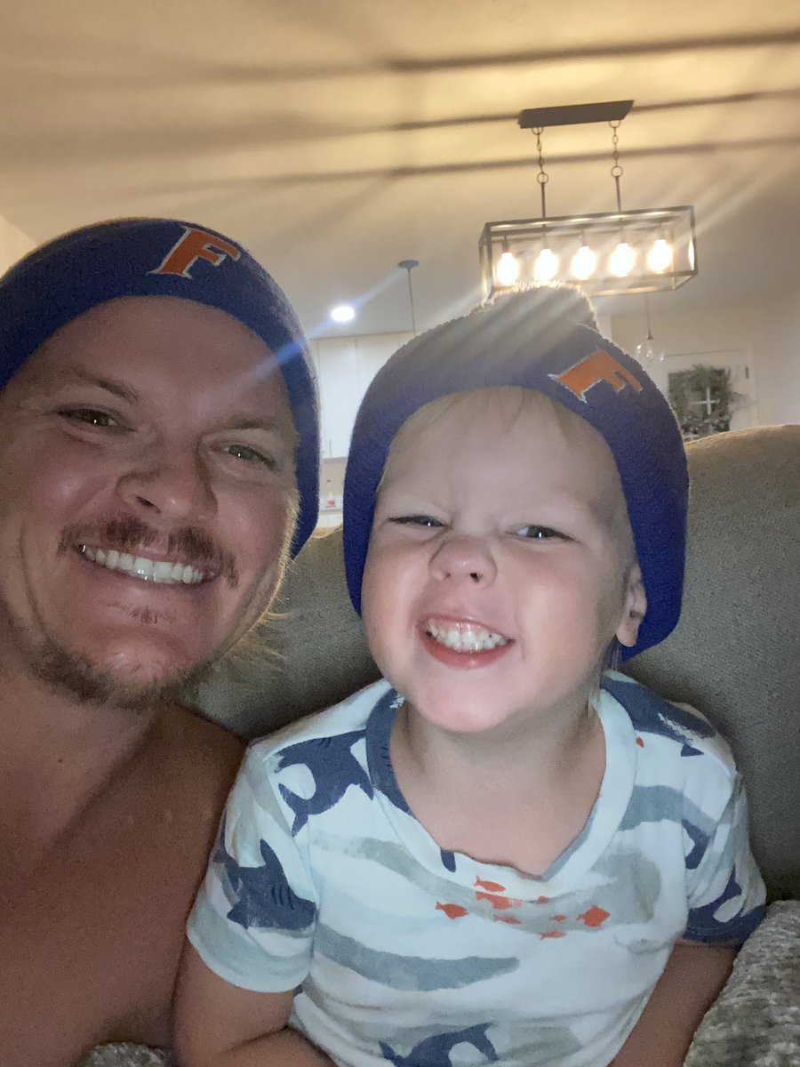Beef_Stew90's tweet photo. Only 2 of our 5 are home. The wife and #babybeef are stuck in the hospital and the #oldestbeef is on vacay with his mom. But #middlebeef and I are enjoying college football being back and our matching @FloridaGators beanies! https://t.co/uAzFHXE44p