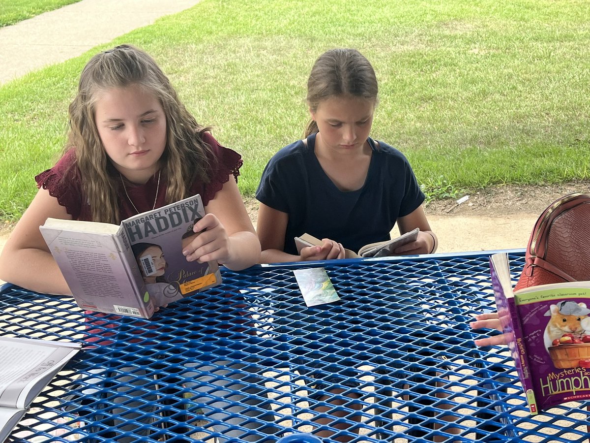 BMSLionPride's tweet photo. 5th graders enjoying the nice weather in the new pavilion while doing some reading. It was a beautiful day. #bmslions #lovetoread https://t.co/cx8Yxh0RYt