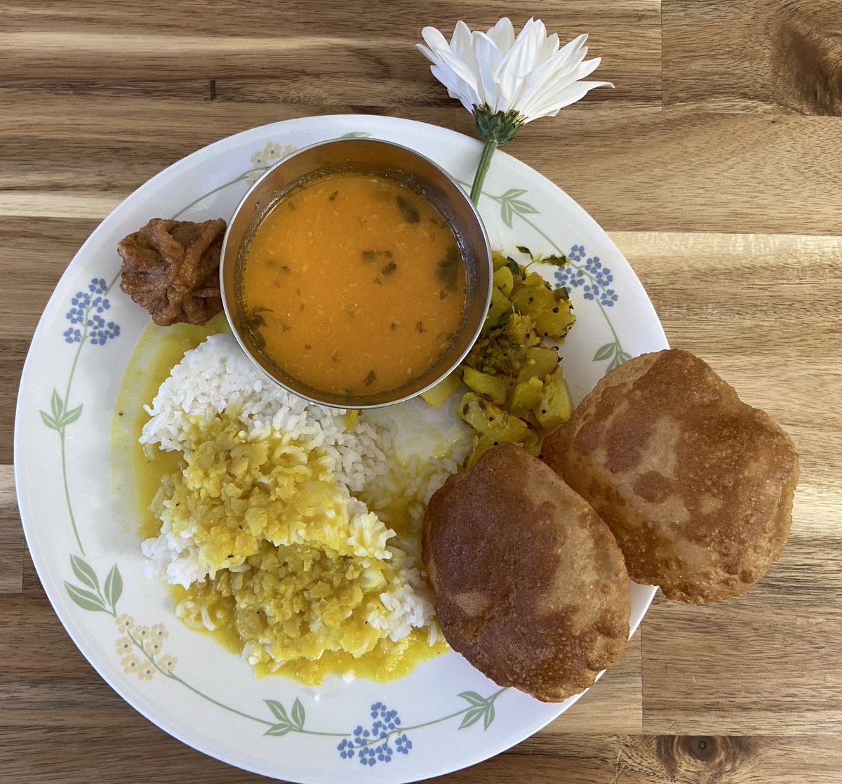 wouldbscientist's tweet photo. Celebrating Ganesh Chaturthi with traditional Maharashtrian festival food, featuring Tomato Saar (tomato soup), Ukadlelya Batatyachi Bhaji (Potato curry), Puri, Talnicha Modak (Fried Modak - a sweet dumpling), and Sadha Varan Bhaat with ghee and lemon (plain lentils &amp; rice). https://t.co/1t9r1cwatC