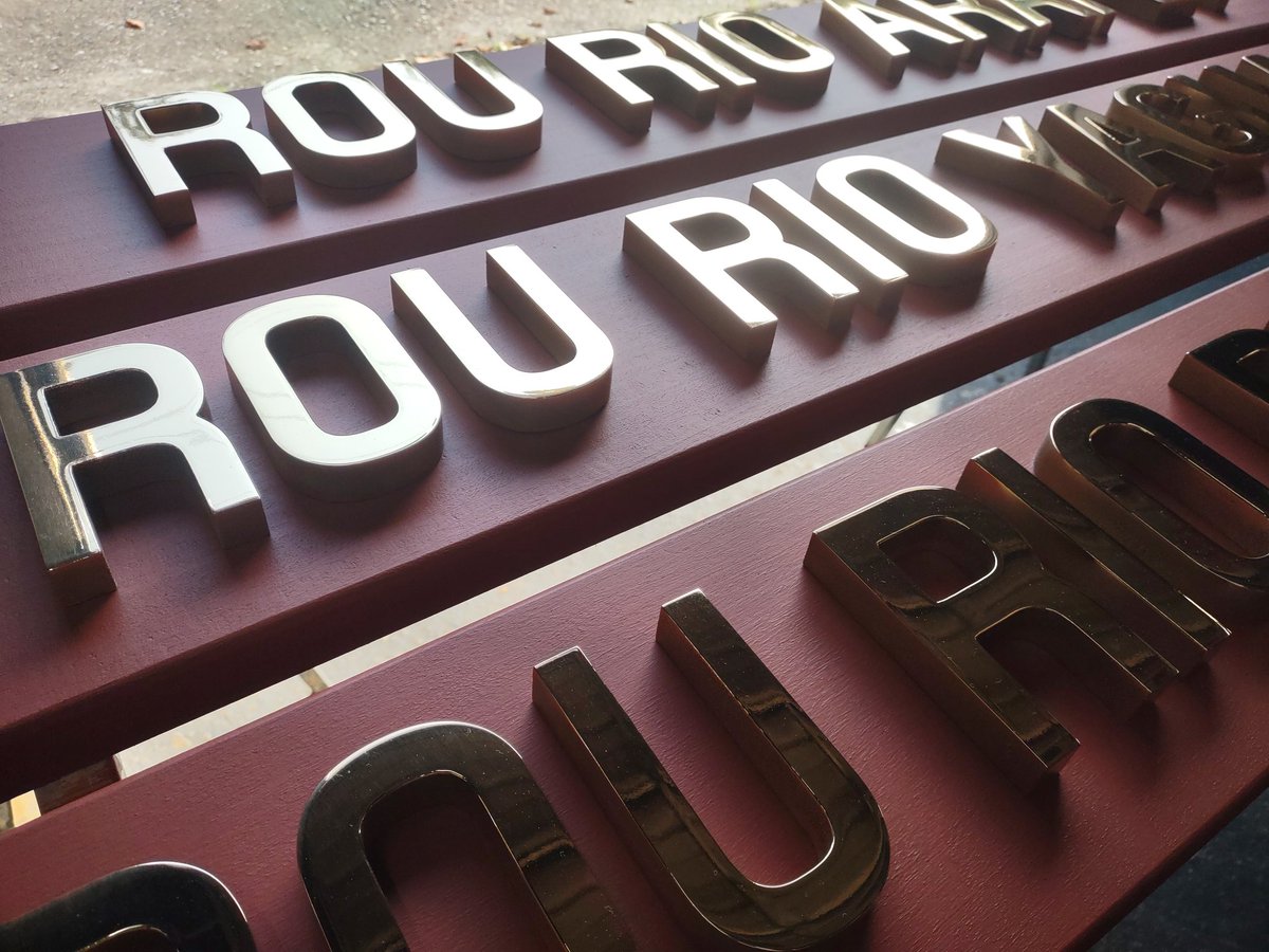 DesignsandSigns's tweet image. More photos of polished bronze letters, pin mount on mahogany. We used barn red stain to protect and color the wood. #sailing #bronze #lettering #signage #NauticalArtwork