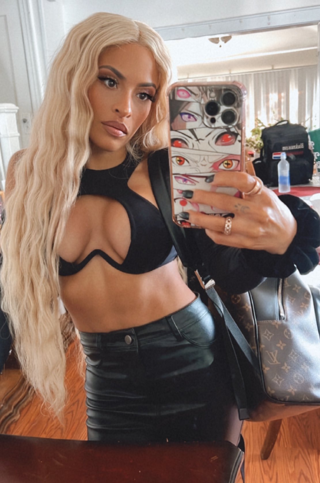 Zelina Vega shows off with her "Boricua Barbie" cut-out top selfi...