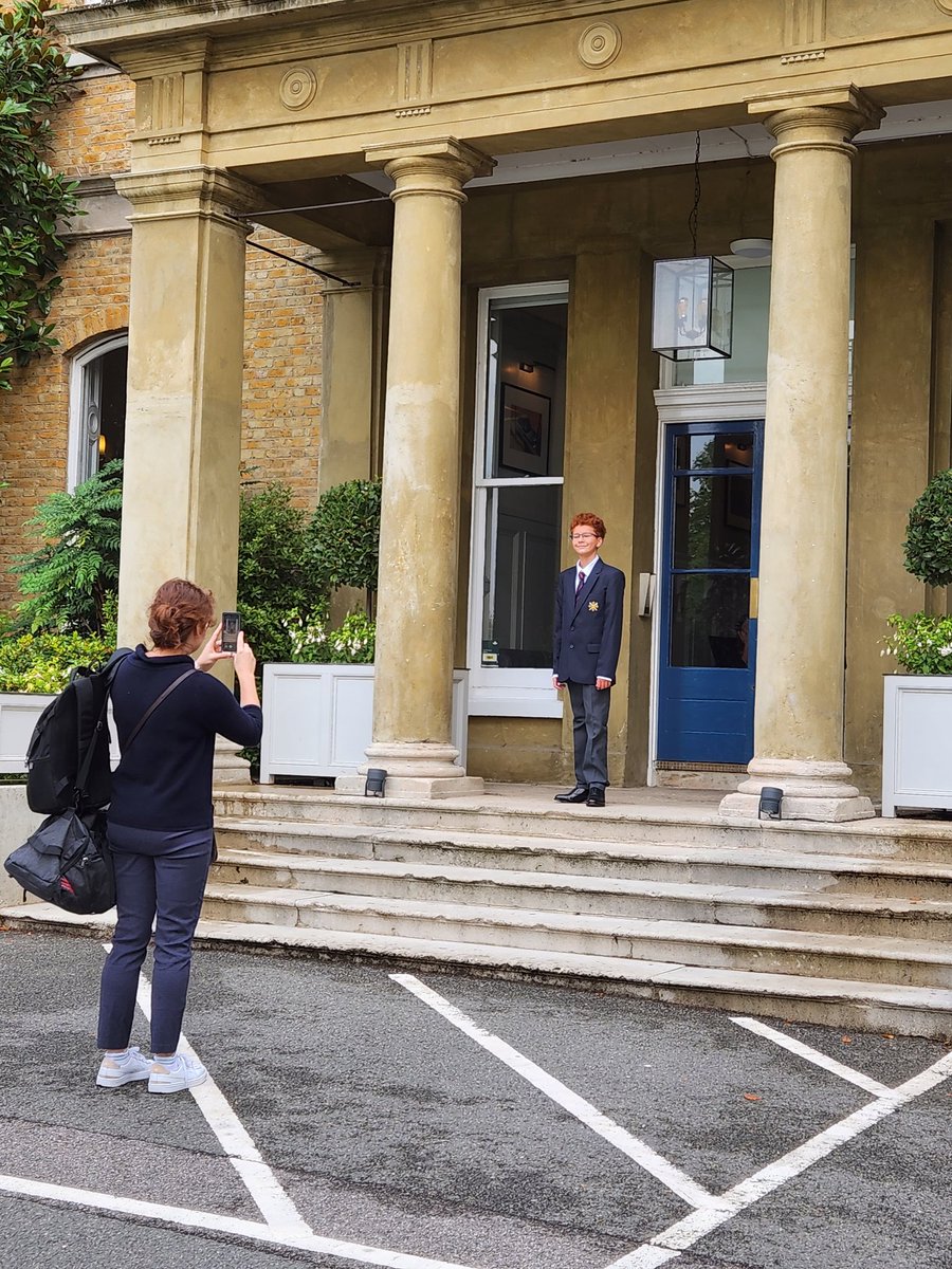 ElthamHead's tweet photo. I love this tradition of photos on the front step on the first (and then many years later) final day. https://t.co/zr5Mr1HfRF