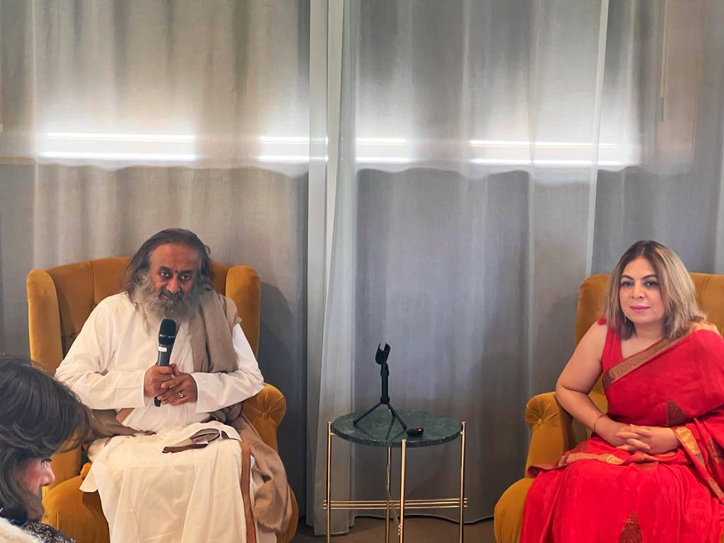 Gurudev's tweet photo. Spoke with diplomats of several countries at the Asia House in Copenhagen, hosted by the Ambassador of India to Denmark H.E. @pooja_kapur. https://t.co/VKPhIK9ing
