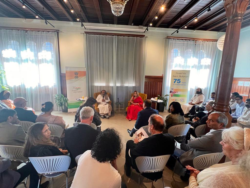 Gurudev's tweet photo. Spoke with diplomats of several countries at the Asia House in Copenhagen, hosted by the Ambassador of India to Denmark H.E. @pooja_kapur. https://t.co/VKPhIK9ing
