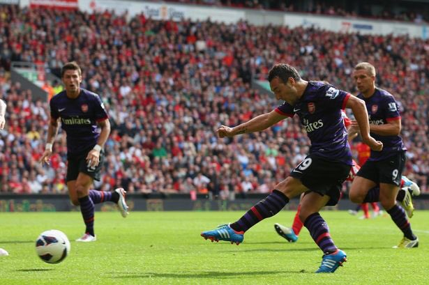 afcstuff's tweet photo. On this day in 2012: Summer signings Lukas Podolski &amp; Santi Cazorla both scored their first goals for the club as Arsenal beat Liverpool 2-0 at Anfield, their second successive win at the stadium that year. #afc https://t.co/WfC52EMYz3