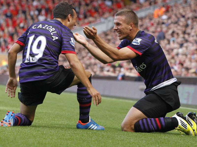 afcstuff's tweet photo. On this day in 2012: Summer signings Lukas Podolski &amp; Santi Cazorla both scored their first goals for the club as Arsenal beat Liverpool 2-0 at Anfield, their second successive win at the stadium that year. #afc https://t.co/WfC52EMYz3