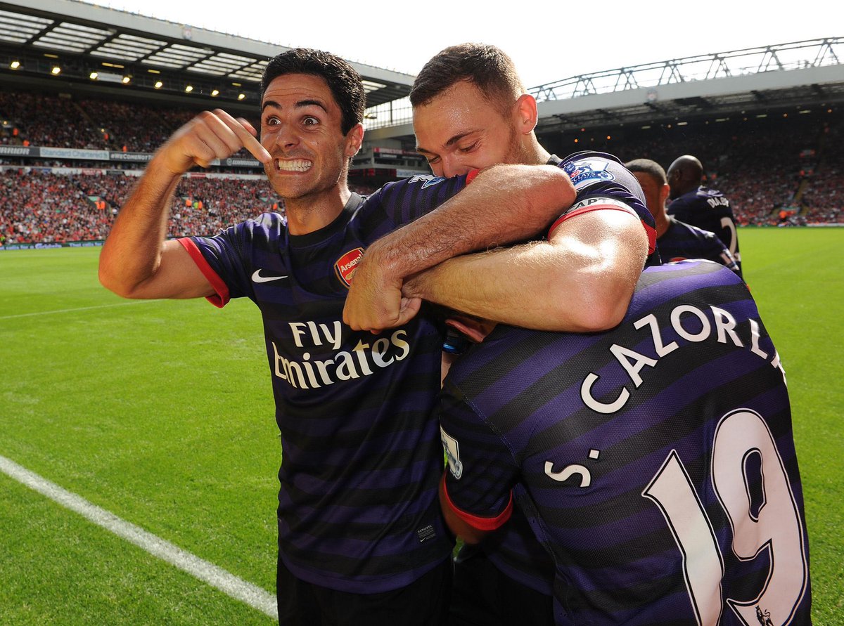 afcstuff's tweet photo. On this day in 2012: Summer signings Lukas Podolski &amp; Santi Cazorla both scored their first goals for the club as Arsenal beat Liverpool 2-0 at Anfield, their second successive win at the stadium that year. #afc https://t.co/WfC52EMYz3