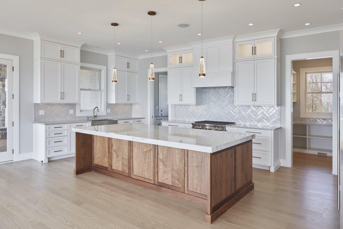 Groom_co's tweet photo. This custom kitchen was recently completed by our talented residential team. The oversized wood island, grey chevron backsplash and white cabinetry all tie together to create this dreamy space. 
#kitchen #customhome #groomsonctruction #kichenreno #newbuild #luxurykitchen https://t.co/4LBEKogd5j