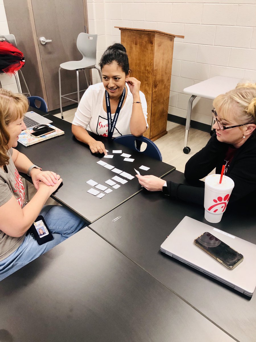 PenniArner1's tweet photo. PLC facilitators discussing beliefs and values related to our learning communities. It’s all about focused learning and growing together. #buildingthenest ⁦@criddle62⁩ ⁦@BethLoedding⁩ ⁦@MrMino27⁩ ⁦@ZinkEd_u⁩ ⁦@HeatherGordy⁩ ⁦@PLCoachStrang⁩ https://t.co/3TRuNNYyPW