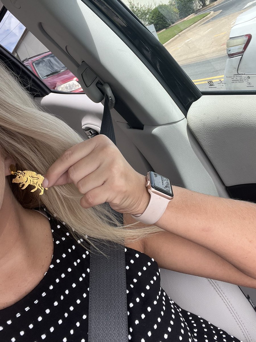 samanthaboyd98's tweet photo. The tradition continues. Year two of wearing my hog earrings to work every Friday before a game. #sportysam https://t.co/e6kM1OhoXg