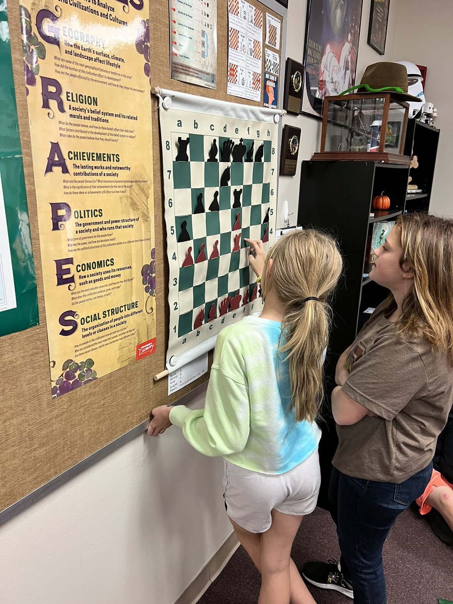 mwoods67037's tweet photo. Social Studies students learning to play chess! The game helps students build essential real world skills, such as planning, critical thinking, geometry/mathematics, and those extremely important social skills. #Rm117 #gamification #BPMS #SocialStudies https://t.co/zyGM9B1lpg