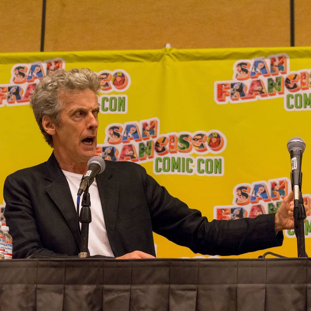 brinatello's tweet photo. #FlashbackFriday (September 2, 2017): #PeterCapaldi attends @SF_ComicCon to meet fans and receive lovely gifts such as this #TARDIS shaped ukulele at his Q&amp;A panel. 🥰💕 Photos by Justin Lai. #DoctorWho #TwelfthDoctor #SFCC2017 #SFComicCon2017 #FridayVibes https://t.co/eiMTZTGDkh https://t.co/natzsEWC9T