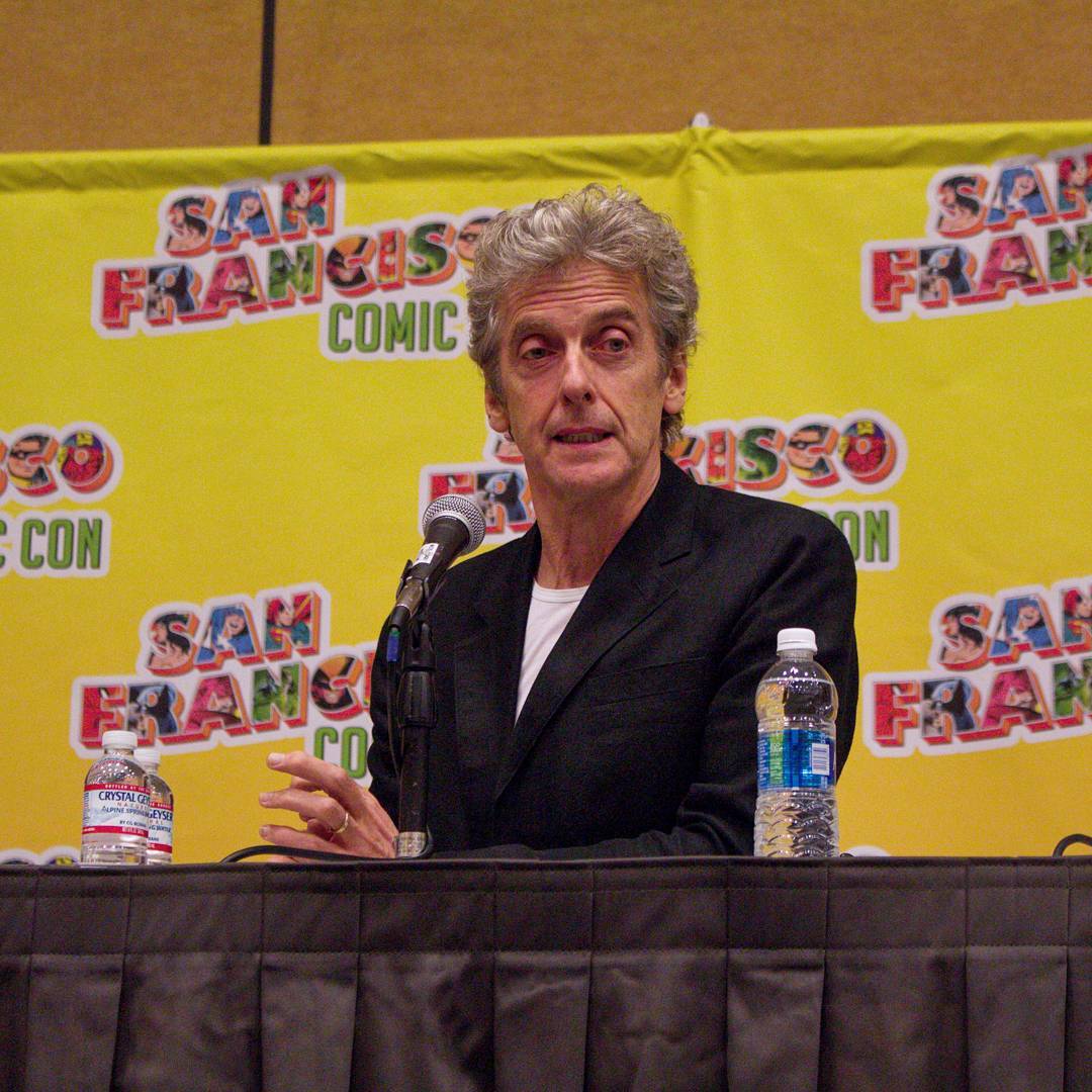 brinatello's tweet photo. #FlashbackFriday (September 2, 2017): #PeterCapaldi attends @SF_ComicCon to meet fans and receive lovely gifts such as this #TARDIS shaped ukulele at his Q&amp;A panel. 🥰💕 Photos by Justin Lai. #DoctorWho #TwelfthDoctor #SFCC2017 #SFComicCon2017 #FridayVibes https://t.co/eiMTZTGDkh https://t.co/natzsEWC9T