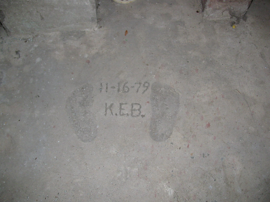 RadHardened's tweet photo. my infant footprints in concrete at my late grandmother's house (taken with flash) https://t.co/8oIfHgcmdX