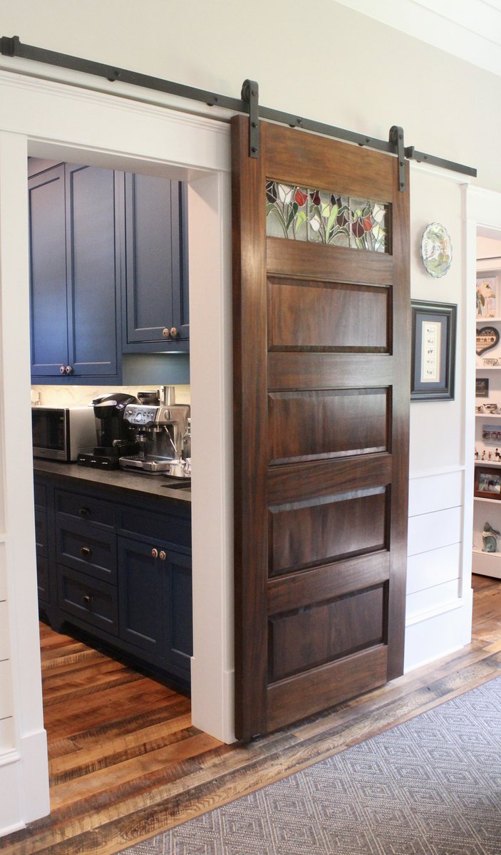Sarah_Donehoo's tweet photo. Some of this #Athens, Georgia home’s unique #interiordesign choices include blue pantry cabinets and a see-through glass #Cabinet. https://t.co/2vxl1kX5Ut