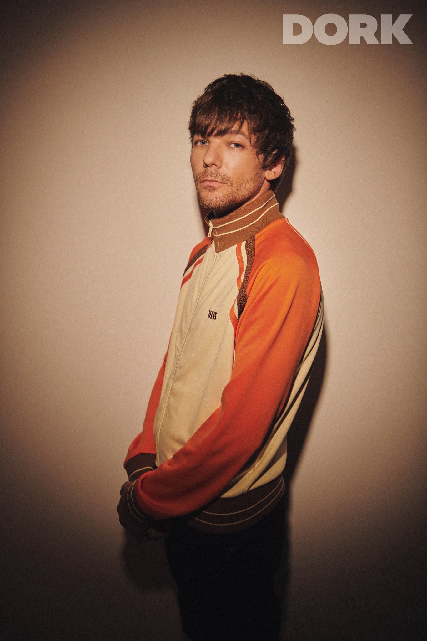 Louis Tomlinson Fashion on X: Louis is wearing a Wales Bonner Percussion  Logo-Embroidered Recycled-Jersey Track Jacket on his photoshoot for Dork  Magazine (@readdork). This jacket takes cues from the '70s with its