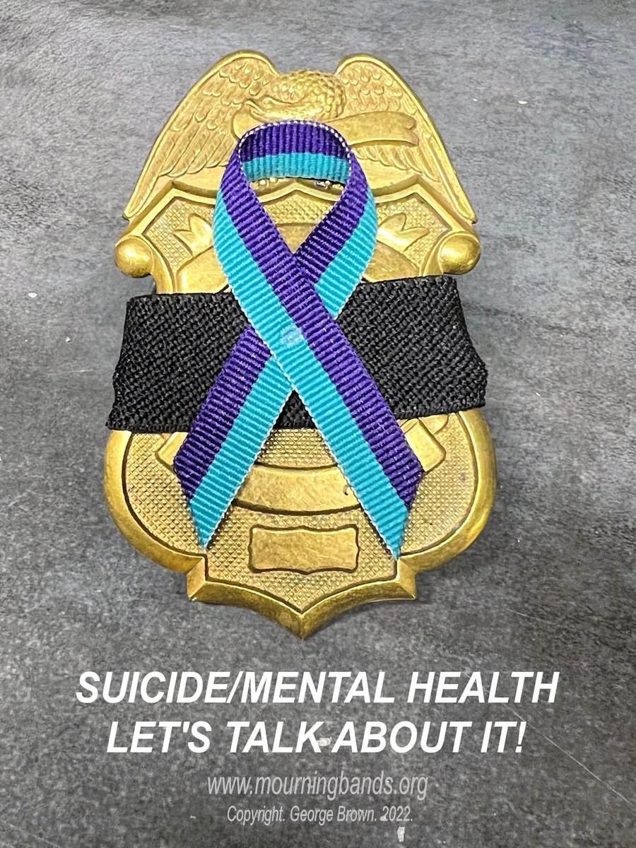 September is suicide prevention month.  badge with Suicide prevention and awareness mourning band with ribbon for law enforcement, firefighters. Emergency medical service and others to promote discussion in their agency and community. Mourningbands.org