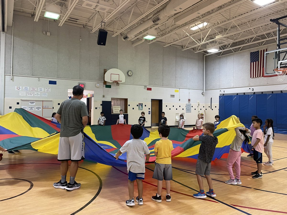 Thank you to Coach Kim and the first graders for letting me enjoy one my favorite kid activities… the parachute. It was so much fun! The smiles and excitement we felt was infectious!