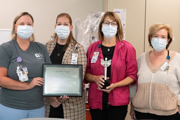 AkronChildrens's tweet photo. After a 36-years in respiratory care, Irene Genet had quite the send-off before retirement. The home care coordinator is the 2022 PHIL Award recipient! Hospitals across the country present the award to an outstanding respiratory therapist. 

Congrats, Irene! 
@TheFACESFound https://t.co/lsgeE2lcNY