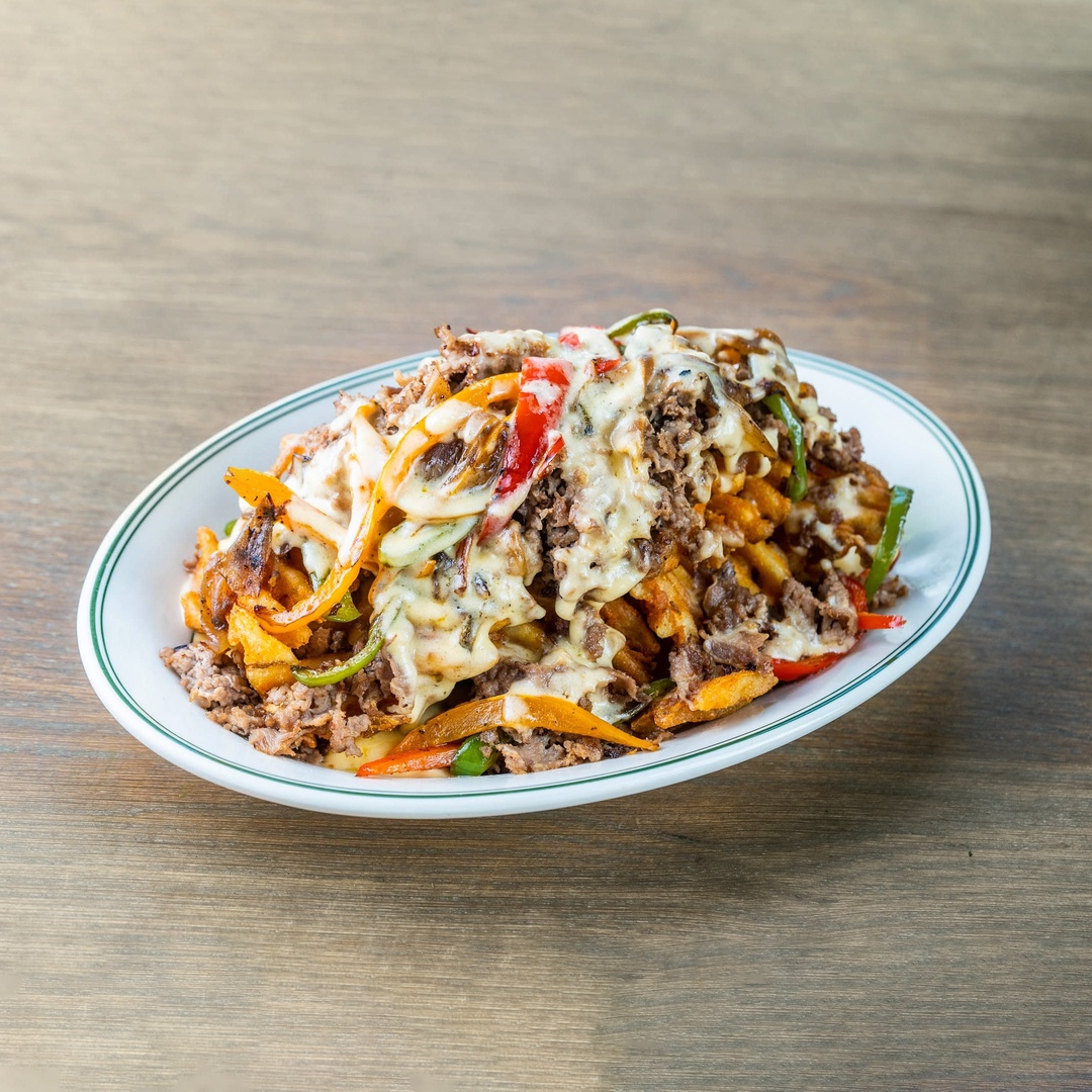 TheMulberryPhl's tweet photo. Everybody loves a #LateNight snack! Stop by #TheMulberryPHL for the Philly Special, waffle fries loaded with Mulberry cheese sauce, peppers, and steak. ➡️ https://t.co/v2CUdZR7hv 

#phillyeats #phillyfood #phillyfoodie #philly #philadelphia #phillyfoodies #visitphilly #explorePHL https://t.co/nIAErYlddF