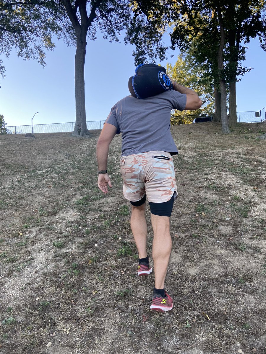 Getting stronger can simply be you, a sandbag and a short hill or set of long stairs. No expensive gym membership needed. 
Your legs will get strong, core will be lit up like a Christmas tree.