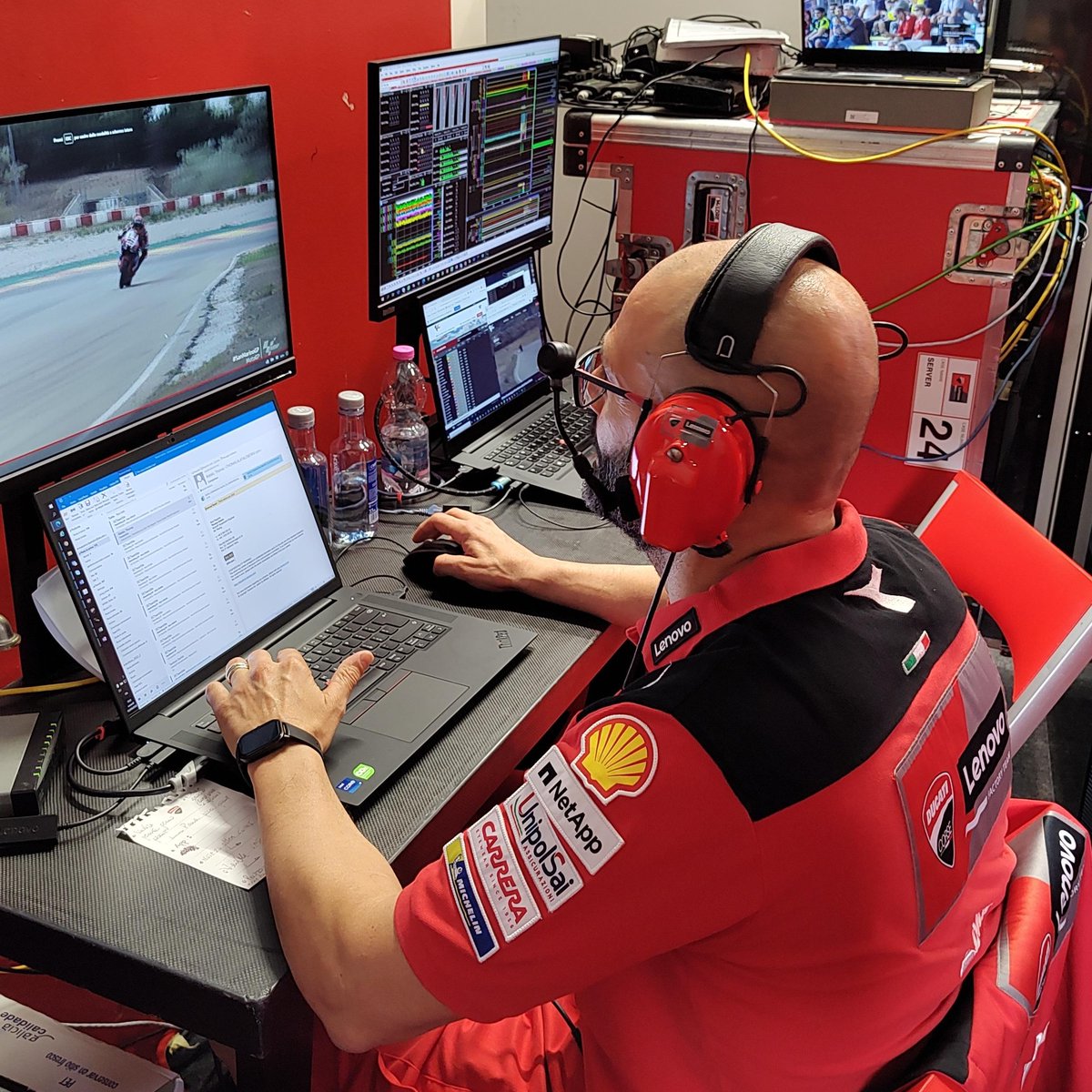 Lenovo's tweet photo. Rain can't stop us! 🌧 With dozens of sensors on each @ducaticorse bike, Lenovo technology is helping engineers prepare for any scenario.

Follow the #DucatiLenovoTeam this weekend for the #SanMarinoGP &amp; watch out for more behind-the-scenes action! 👀
