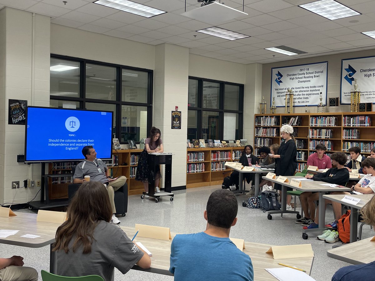 Media4Grizzlies's tweet photo. Welcome to The Great American Revolution Debate starring Principal Santoro as King George. Mrs. Hudson's APUSH colonists pled their case before the King in the media center this week. Revolution is imminent.
#CVHSmediamatters @ccsdmedia @ms_greencvhs @Prin_Santoro https://t.co/6236LFBw1H