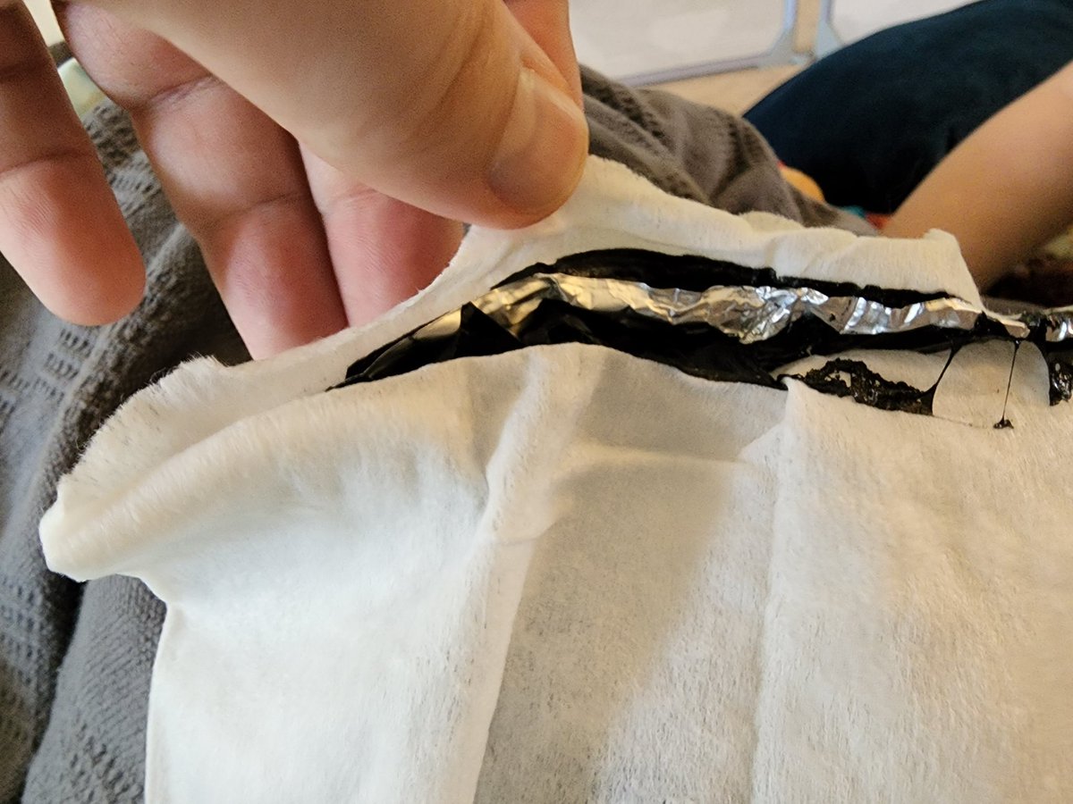 AGrowlyBear's tweet photo. @DUDEwipes what is this gunk that was stuck between two of my wipes in the package? Is it safe? https://t.co/EDX4RTyNNG