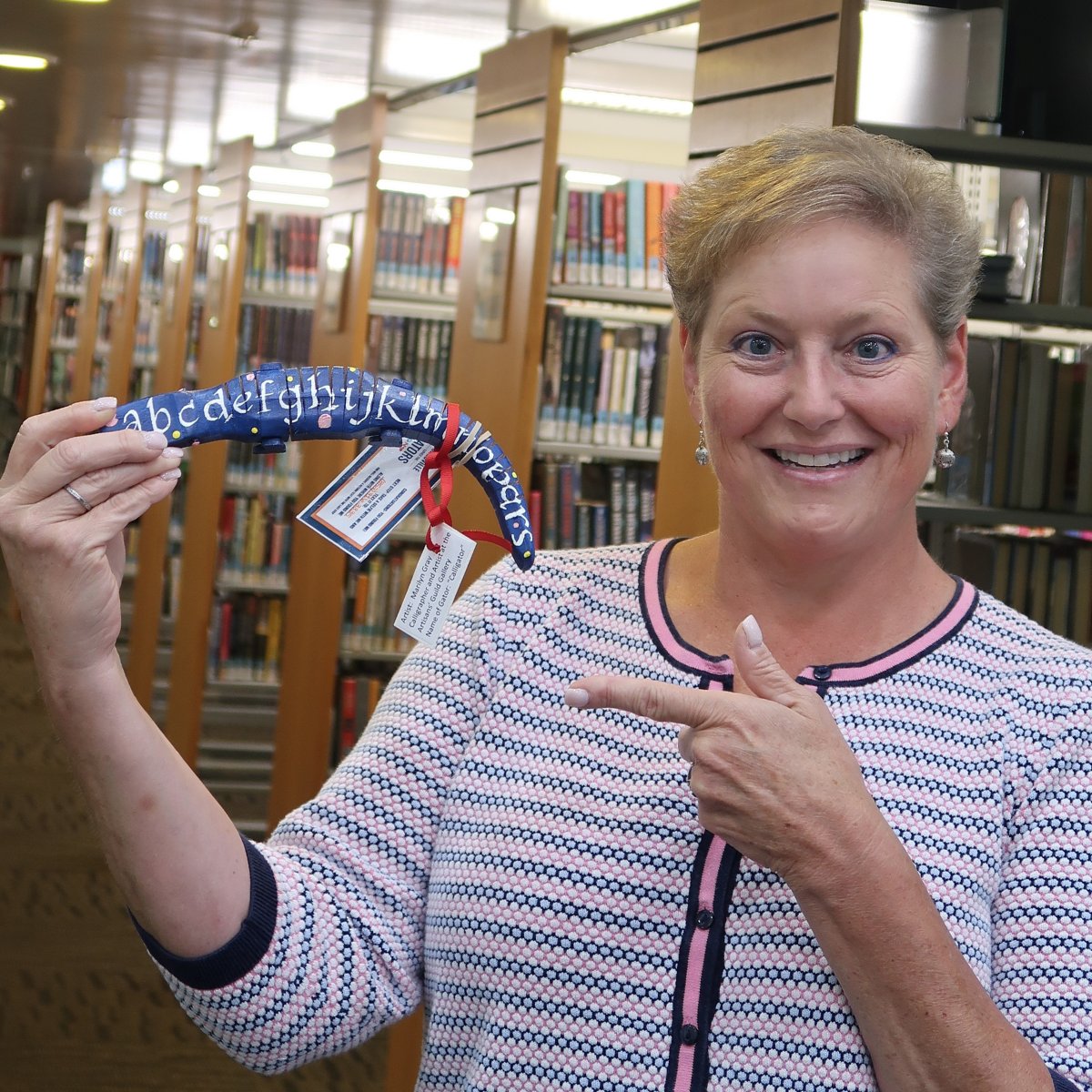 alachualibrary's tweet photo. ππ Calligator enjoyed their trip to Headquarters Library in downtown Gainesville. Congratulations to Stacey Berceli who found this gator!
#gnvlovesgators @GNVChamber
#dukeenergy #gainesvillesportscommission #artisansguildgallery https://t.co/it0lE28Jhx