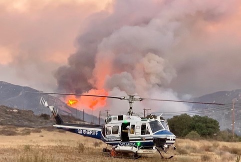 Our <a href="/SDSheriff/">San Diego Sheriff</a> ASTREA helicopters are essential in helping to put out the #Border32Fire. From water drops to transporting firefighters and their equipment to remote locations. We work in partnership with <a href="/CALFIRESANDIEGO/">CAL FIRE/San Diego County Fire</a> to provide resources from the air and ground.📸Josh Stotler