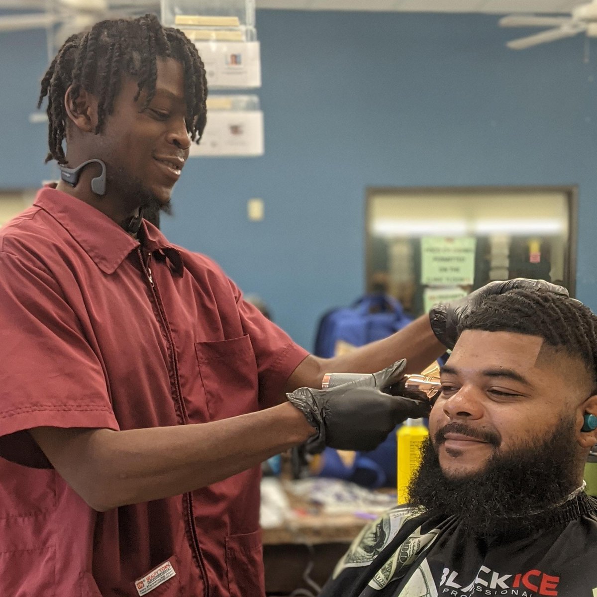 Jamarion Steward working on a client.