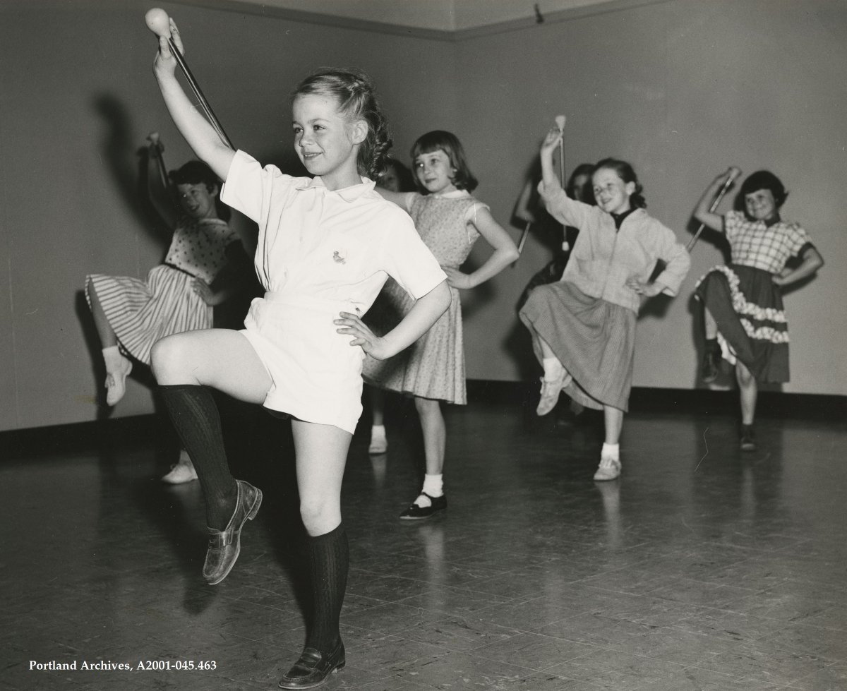 From PDX Archives-Ten-year-old Linda Bennet leads her baton group in practice for the 1956 Barr Brothers’ Circus, an annual event at Peninsula Park, where children displayed their athletic talents in the 1940s – 1960s. bit.ly/3ege48A #ArchivesSports #ArchivesHastagParty