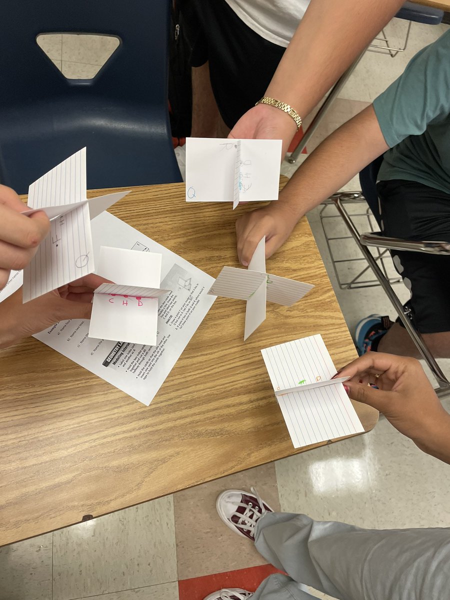 MsVulin's tweet photo. Students work together to model intersecting planes in Geometry! #ewlearns https://t.co/6T7IVvHZ4c