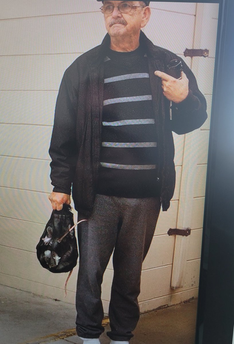 Claytonator23's tweet photo. @MKupperman @shutupmikeginn I just started watching the documentary "Pervert Park" and this "sack of rats" incident comes up ~13min into the doc, and I couldn't believe how nonchalant the guy was carrying it. Here's a pic: https://t.co/Mk0qO3YW6E