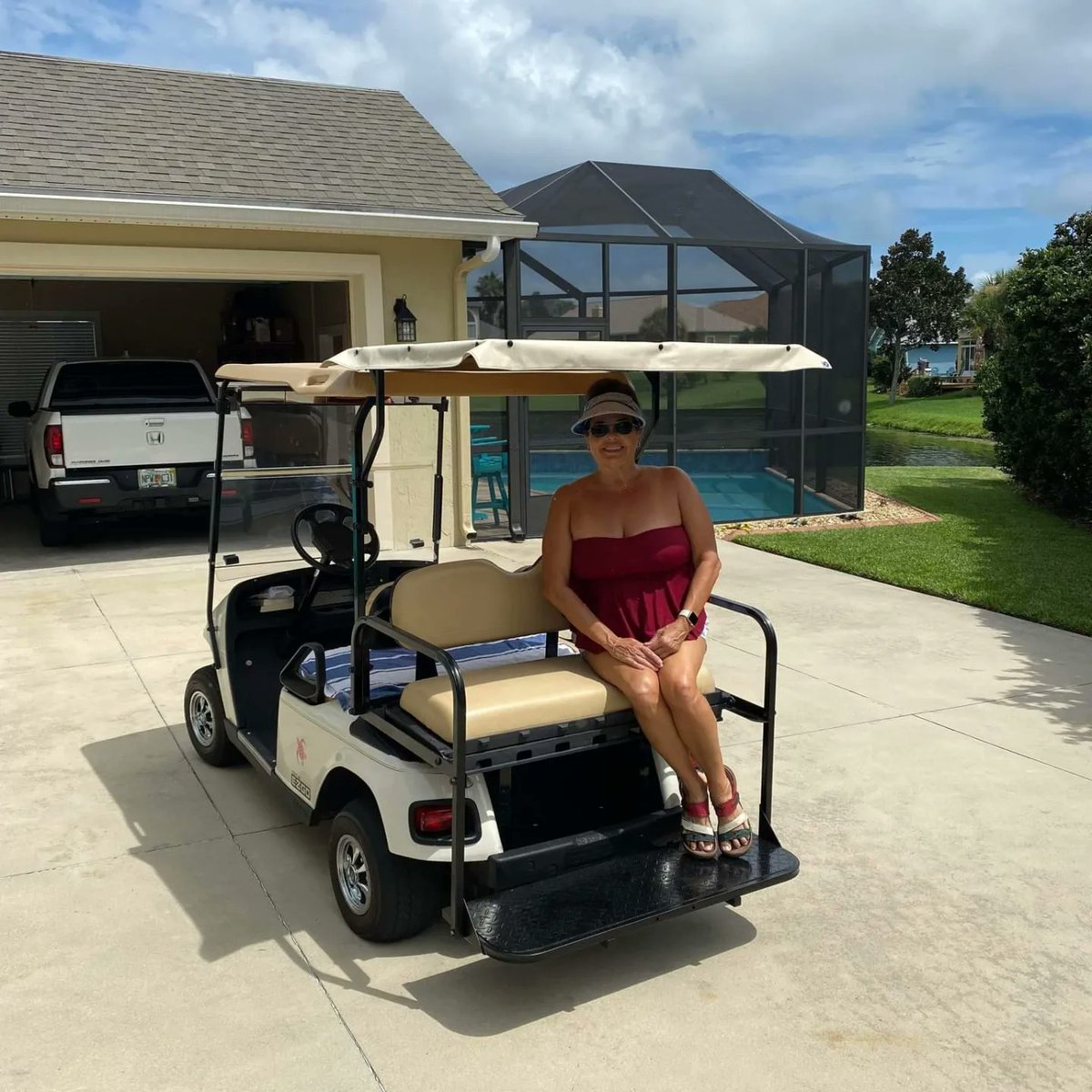ForeFlip's tweet photo. This 2012 @EZGOvehicles needed some rear seat shade. Adding our Extension Top is easy, functional and looks great too! Also for @clubcar @YamahaGolfCars as well! https://t.co/lCVGGFHabA #madeintheusa #customcartcovers #golfcarts #golf #golfgifts #wecoveryourrear #patented https://t.co/1t8wYNMC42