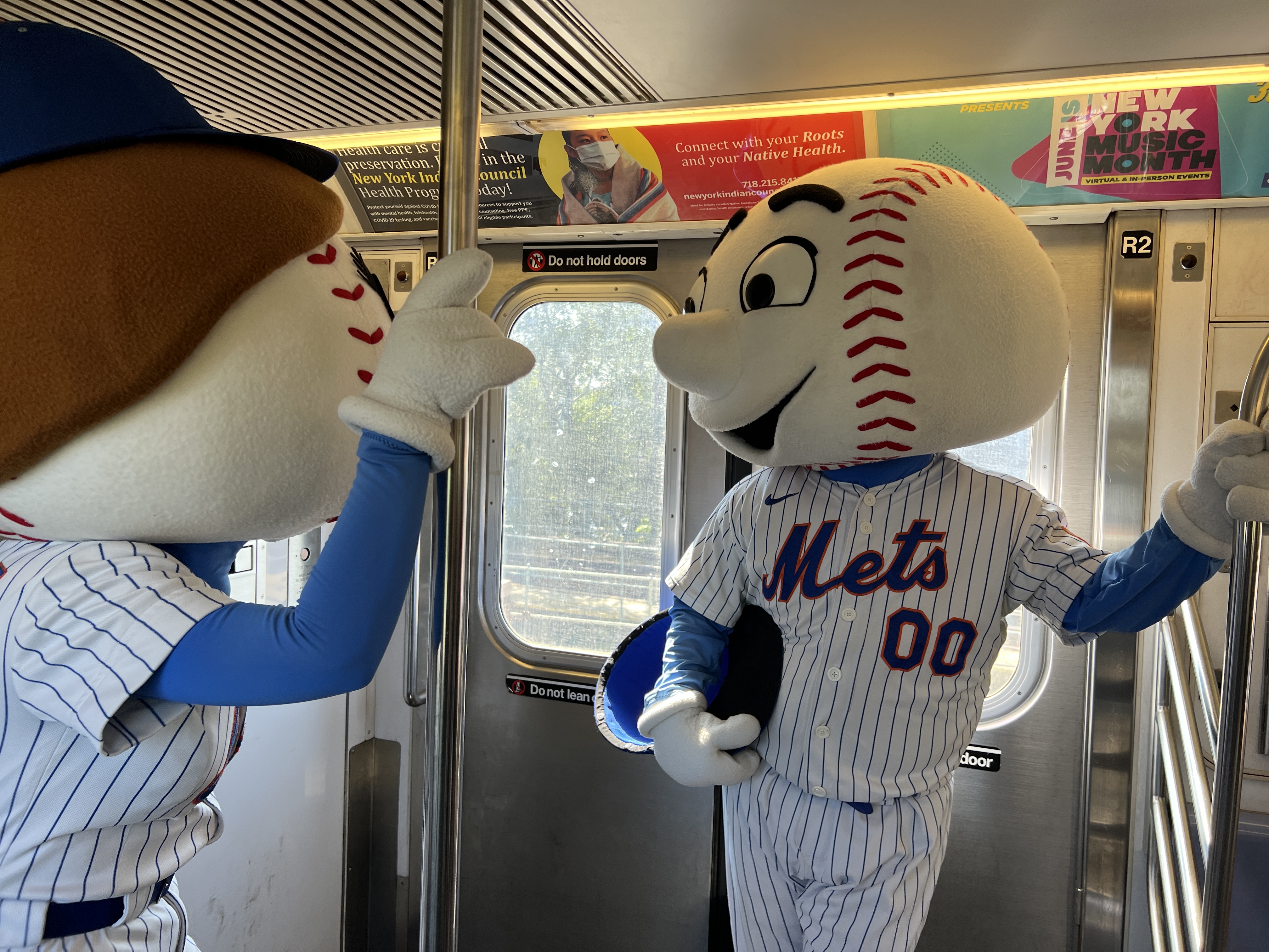 Citi Field on X: .@MrMet and @MrsMet take the train to the game