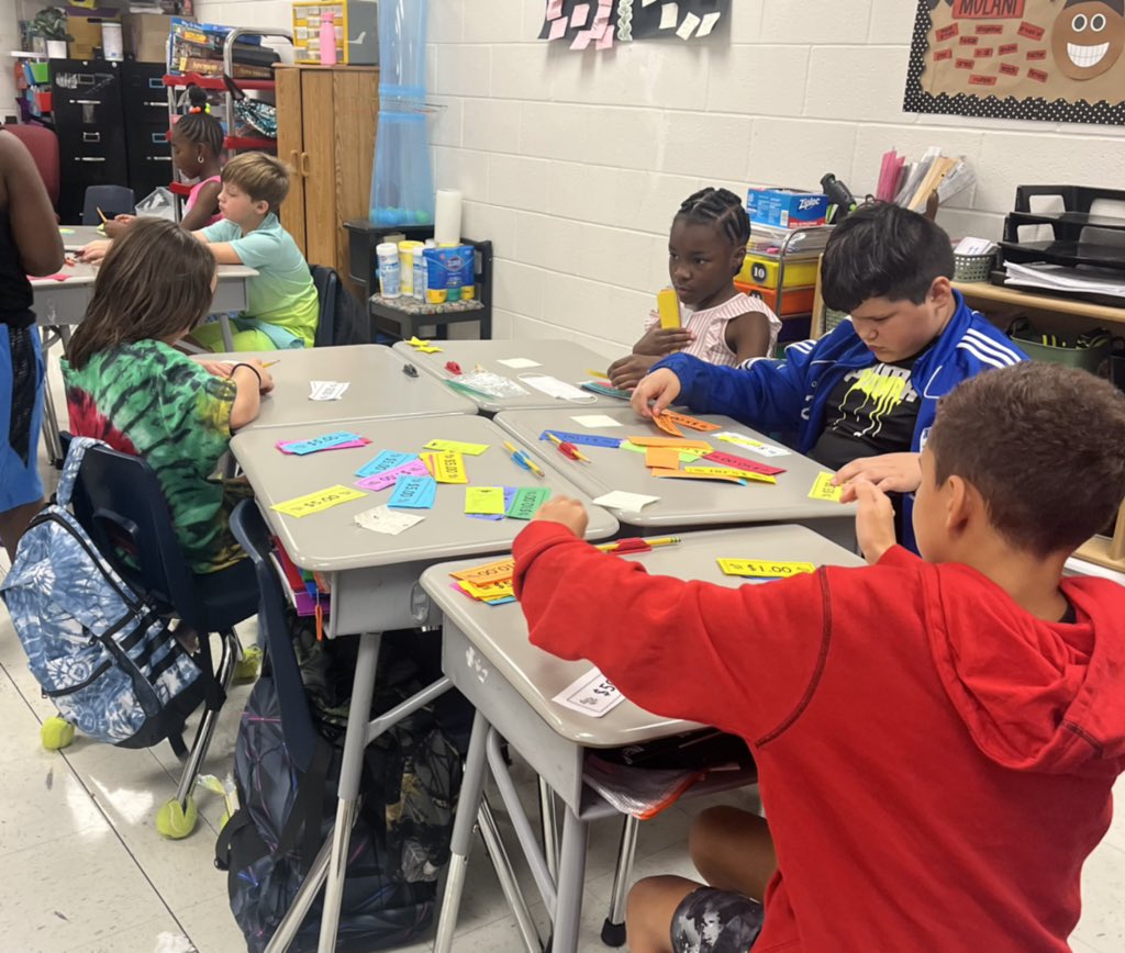 SmithJama's tweet photo. Ss are excited to count their money earned for great behavior and participation this week for our class auction. Math, fun, and real life skills for the win! #MightyMustangs @DCS_Overpark https://t.co/4Dsdh9V8lQ